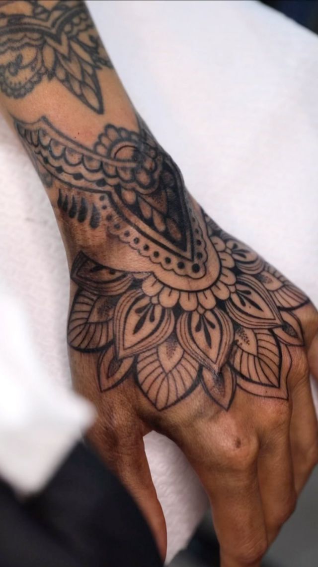 Did this mandala a while ago for @lotte_h27 . Added the mandala and fixed an old tattoo (not done by me). Done @paradigm_tattoo !!  .
.
.
.
.
#mandala 
#mandalatattoo #mandalaart #mandalaartist 
#handtattoo #tattoo #tattoos #tattooideas #blackwork #blackworkers #ink #inktattoo #mandaladesign