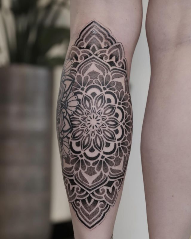Dotwork mandala from a while ago @tschanni86 . this is part of a leg sleeve I’m currently working on. swipe 👉to see the upper part. everything is still in progress. Let me know what you guys think !!  .
.
.
.
.
#mandala #mandalatattoo #mandalaart #ink #geo #dot #dotworkers #dotwork #doterra #inktattoo #inklife